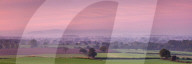 Autumn dawn across the Cheshire plain with Beeston Castle and the Peckforton Hills receding into the morning mist, Cheshire, England, United Kingdom, Europe