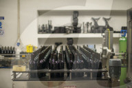 Douro wine being bottled at a winery in the Alto Douro region of Portugal, Europe