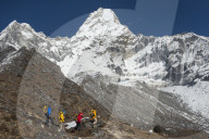 A climbing team with views of Ama Dablam, Everest region, Himalayas, Nepal, Asia