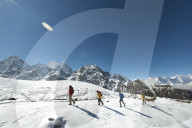A team of four climbers return to base camp after climbing Ama Dablam in the Nepal Himalayas