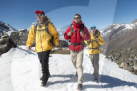 A team of four climbers return to base camp after climbing Ama Dablam in the Nepal Himalayas