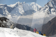 A team of four climbers return to base camp after climbing Ama Dablam in the Nepal Himalayas