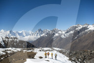A team of four climbers return to base camp after climbing Ama Dablam in the Nepal Himalayas