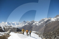 A team of four climbers return to base camp after climbing Ama Dablam in the Nepal Himalayas