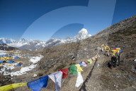 A team of four climbers return to base camp after climbing Ama Dablam in the Nepal Himalayas