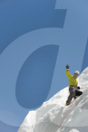 A climber practises on an ice wall in preperation for climbing Everest