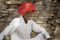 A an old man from Bundi rests during the hot hours of the day in India