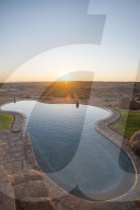 A swimming pool on the edge of the desert at Canyon Lodge near the Fish River Canyon, Namibia, Africa