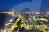 Skyline and Corniche, Al Markaziyah district by night, Abu Dhabi, United Arab Emirates, Middle East