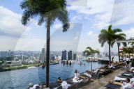 Infinity pool on the roof of the Marina Bay Sands Hotel with spectacular views over the Singapore skyline, Singapore, Southeast Asia, Asia