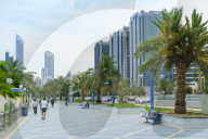 Joggers on the Corniche, Abu Dhabi, United Arab Emirates, Middle East
