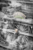 The Flying Scotsman steam locomotive arriving at Goathland station on the North Yorkshire Moors Railway.