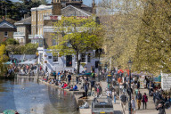 Members of the public enjoy the sunshine in London.
