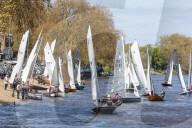 Members of the public enjoy the sunshine in London.