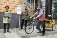 Bristol police admit protest ban under Covid powers was unlawful
Force apologise and will pay damages for arresting four protesters at Colston statue-toppling hearing