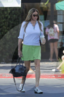 Caitlyn Jenner is a fan favorite as she poses for selfies during a Starbucks coffee run in her LA neighborhood. 