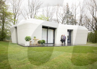 Dutch couple become Europe’s first inhabitants of a 3D-printed house. New home in shape of boulder is first legally habitable property with load-bearing walls made using 3D-printing technology