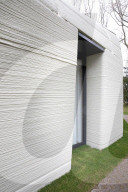 Dutch couple become Europe’s first inhabitants of a 3D-printed house. New home in shape of boulder is first legally habitable property with load-bearing walls made using 3D-printing technology
