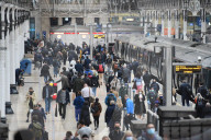Commuters arrive at Paddington today, 13th May 2021. 