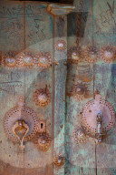 Male (right) and female door knockers giving different sounds to ensure the right gender person receives the guest, in 1500 year