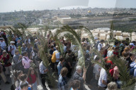 Palm Sunday catholic procession. Mount of Olives. Jerusalem. Israel.