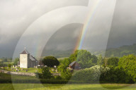 A rainbow over St. David's Church in the tiny Welsh hamlet of Llanddewir Cwm, Powys, Wales, United Kingdom, Europe
