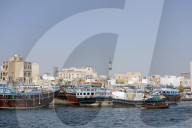 Trading dhows on the docks of Dubai Creek. Deira. DubavØ. United Arab Emirates