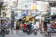 South East Asia, Vietnam, Ho Chi Mihn City (Saigon), backpackers on a city street