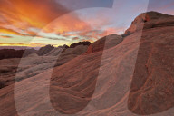 Brilliant orange clouds at sunrise over sandstone, Valley Of Fire State Park, Nevada, United States of America, North America