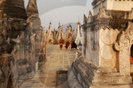 Young novices run through the pagodas, Kakku Pagoda Complex, Myanmar (Burma), Asia