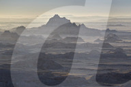 Badlands layers on a hazy morning, Badlands National Park, South Dakota, United States of America, North America