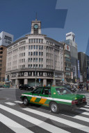 Taxi passing Wako department store in the Ginza district of Tokyo, Japan, Asia