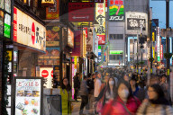 A crowded street at night in the Ginza district of Tokyo, Japan, Asia