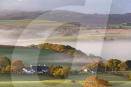 Cottages surrounded by idyllic rolling countryside,  Dartmoor National Park, Devon, England. Autumn (October) 2015.