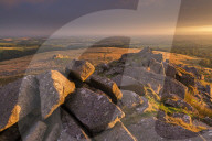 Magical light illuminating Belstone Tor in Dartmoor, Devon, England. Summer (August) 2015.