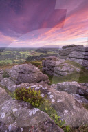 Granite tor on Meldon Hill at sunrise, Chagford, Dartmoor National Park, Devon, England. Autumn (September) 2015.