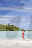 Woman on beach at Les Sables Roses (Pink Sands), Tetamanu, Fakarava, Tuamotu Islands, French Polynesia (MR)