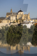 Guadalquivir River (foreground), The Great Mosque (Mosquita) and Cathedral of Cordoba , Cordoba, Spain