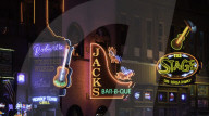 Neon signs and historic music clubs along Lower Broadway in Nashville