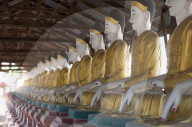 Line of seated Buddhas at the Maha Bodhi Ta Htaung monastery, Monywa township, Sagaing Division.