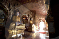 Thanboddhay Pagoda, showing some of the 100,000 Buddhas there, large and small lined up on shelves, Monywa, Sagaing Division.