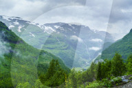 A view of waterfalls and forest from the Flam Railway, Flamsbana. Flam, Norway