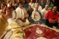 Alawi sufi muslims singing and playing drums.