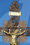 Ars-sur-Fromans. Sanctuary-Shrine of Jean-Marie Vianney (the Cure d'Ars).  Calvary. Golden Christ on the cross.