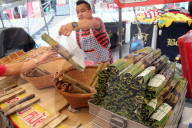 Bangkok Food Market. Sticky rice cooked in bamboo.