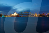 Australia, New South Wales, Sydney, Opera House and Harbour Bridge from Mrs Macquarie's Chair at Dusk
