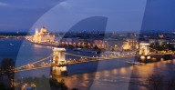 View over River Danube, Chain Bridge and Hungarian Parliament Building at night, Budapest, Hungary