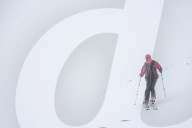 Ski touring in a snow blizzard white out at CairnGorm Mountain Ski Resort, Cairngorms National Park, Scotland