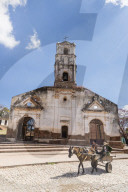 A horse-drawn cart known locally as a coche in the UNESCO World Heritage town of Trinidad, Cuba.