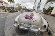 Classic Chevrolet Bel Air taxi with custom 'Che' paint job in the town of Cienfuegos, Cuba.